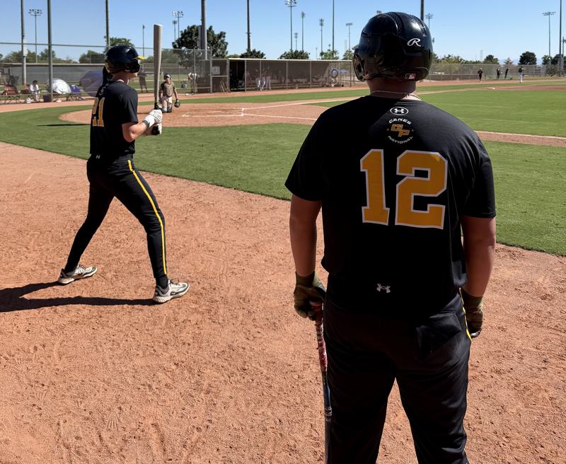Canes 17U player number 12 on deck at the AZ Fall Classic
